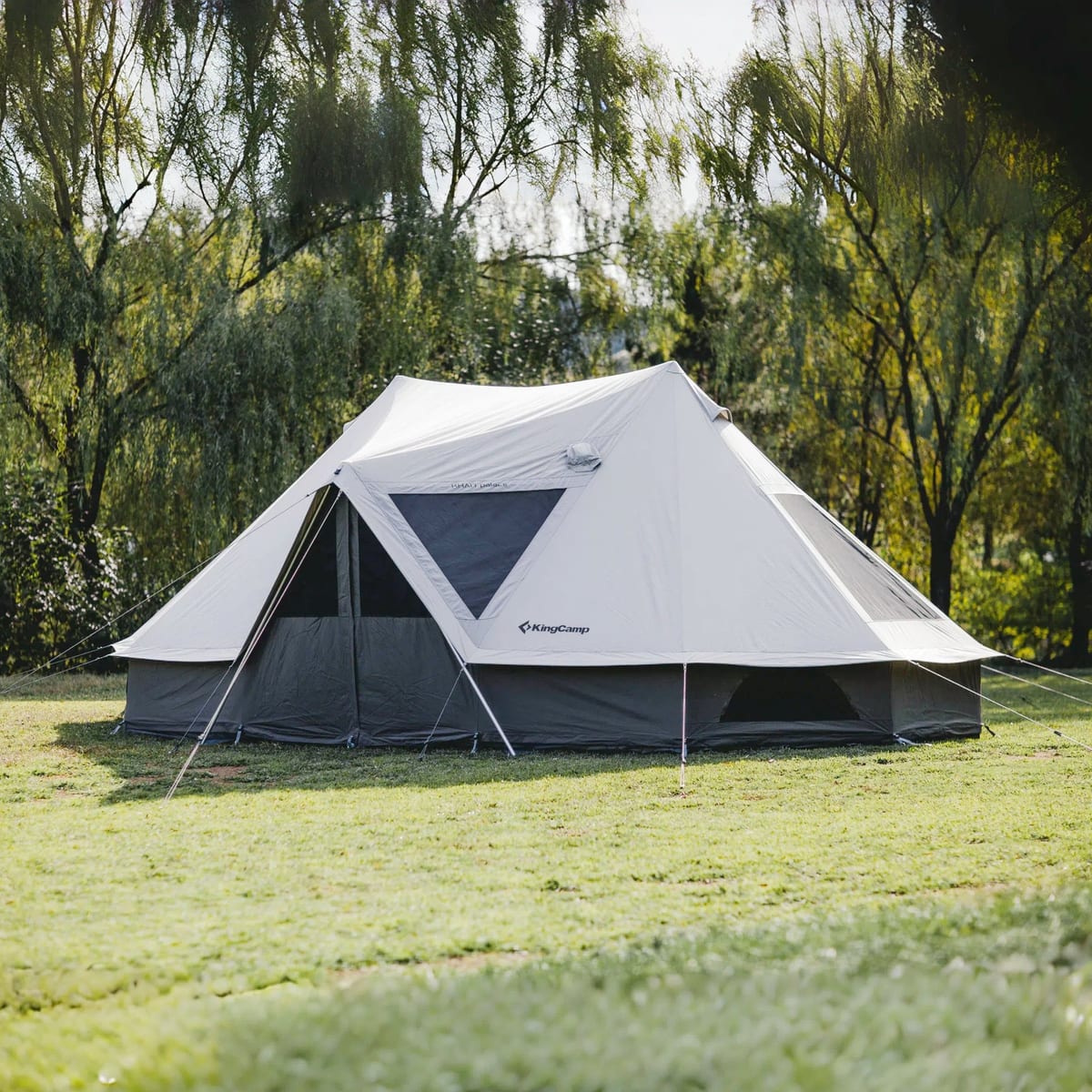 KingCamp Khan Palace 10-12 person glamping tent pitched in a field