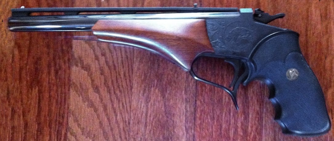 https://alnk.to/bPhTnBU Used Thompson/Center Encore break-action single-shot swappable-barrel rifle on Guns.com