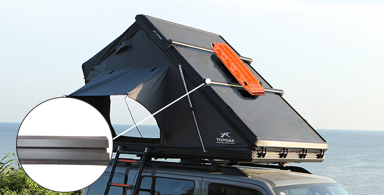 TOPOAK Galaxy Pro Rooftop Tent mounted on an SUV in a mountain camp