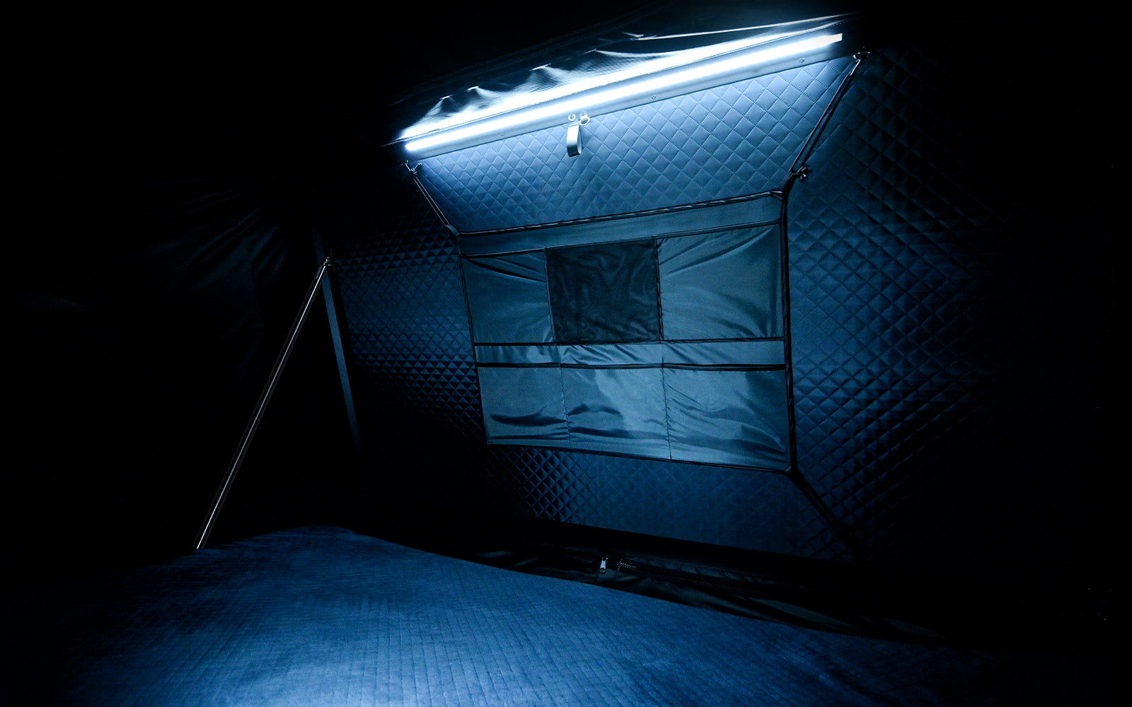 Galaxy Pro interior with velvet ceiling, 3-inch memory foam mattress, and blackout fabric