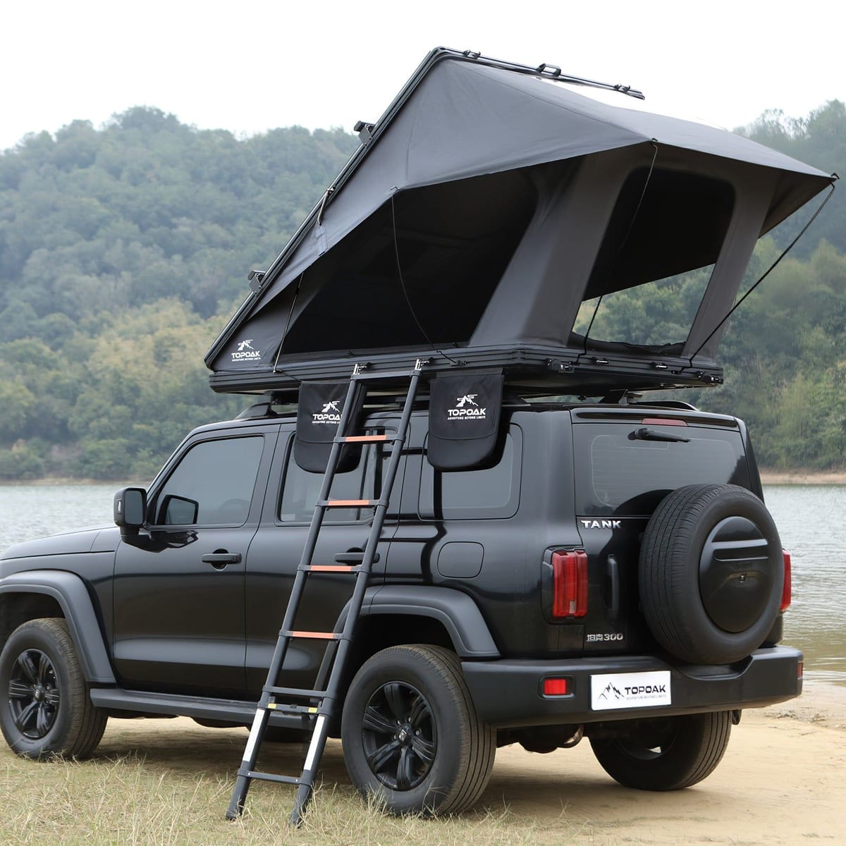 Topoak Galaxy Pro wedge rooftop tent open on an SUV with ladder