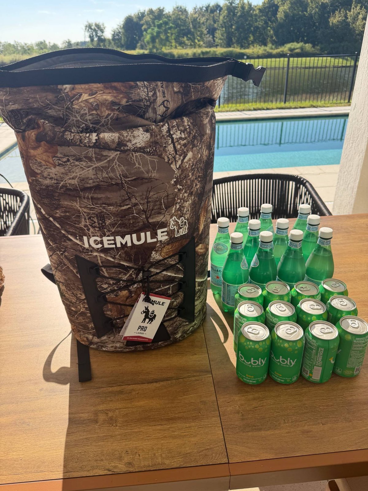 ICEMULE Pro 23L backpack cooler open with its roll-top unrolled